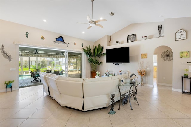 5001 Almar Dr, Punta Gorda, FL 33950 - living area featuring a ceiling fan, light tile patterned flooring, arched walkways, high vaulted ceiling, and recessed lighting