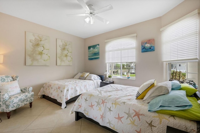 5001 Almar Dr, Punta Gorda, FL 33950 - bedroom with light tile patterned flooring and a ceiling fan