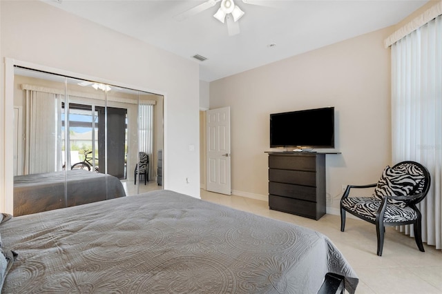 5001 Almar Dr, Punta Gorda, FL 33950 - bedroom featuring access to outside, light tile patterned floors, and a ceiling fan