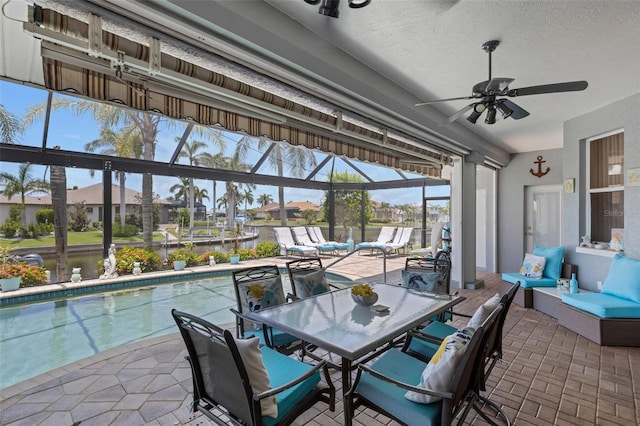 5001 Almar Dr, Punta Gorda, FL 33950 - view of patio featuring a ceiling fan, an outdoor pool, outdoor dining space, and an outdoor hangout area