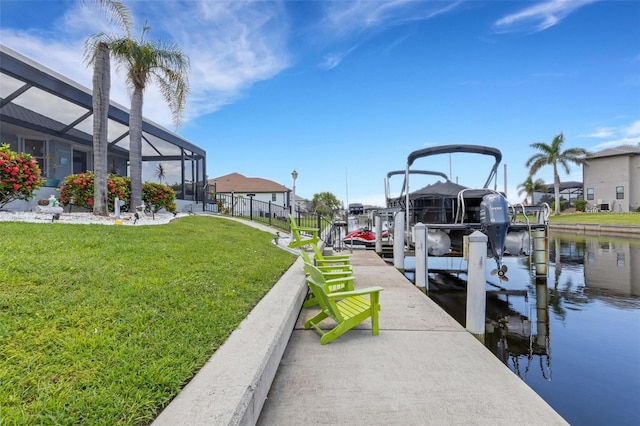 5001 Almar Dr, Punta Gorda, FL 33950 - dock area featuring boat lift, a water view, a yard, and glass enclosure