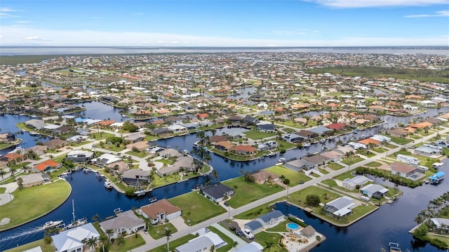 5001 Almar Dr, Punta Gorda, FL 33950 - aerial overview of property's location with nearby suburban area and a nearby body of water
