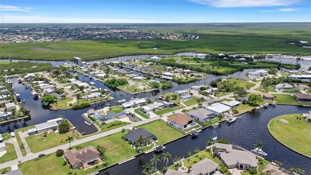 5001 Almar Dr, Punta Gorda, FL 33950 - aerial view of property and surrounding area with a large body of water and nearby suburban area