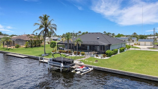 5001 Almar Dr, Punta Gorda, FL 33950 - dock featuring a water view, boat lift, and a lawn