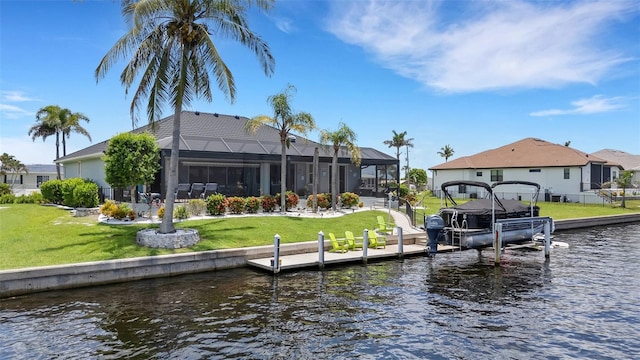 5001 Almar Dr, Punta Gorda, FL 33950 - dock with a water view, boat lift, a yard, and a lanai
