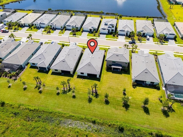 18525 Midsummer Pl, Venice, FL 34293 - aerial perspective of suburban area featuring a large body of water