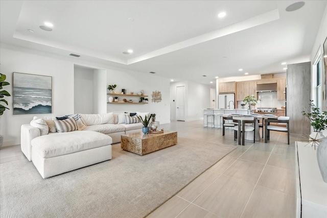 18525 Midsummer Pl, Venice, FL 34293 - living area featuring a raised ceiling and recessed lighting