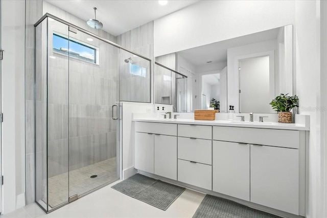 18525 Midsummer Pl, Venice, FL 34293 - bathroom with double vanity, a stall shower, and tile patterned flooring