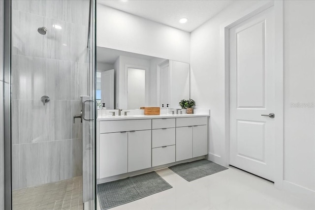 18525 Midsummer Pl, Venice, FL 34293 - bathroom with double vanity, a shower stall, and recessed lighting