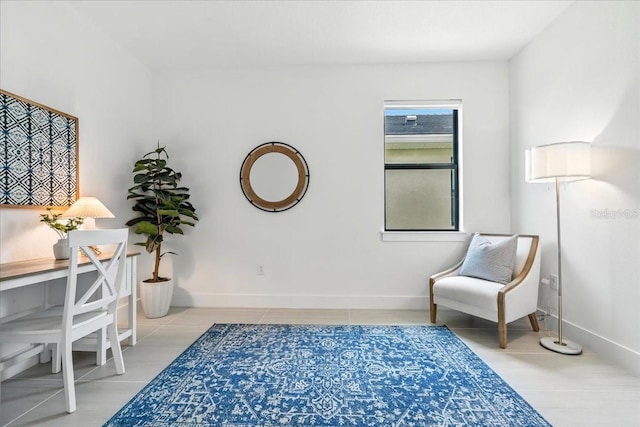 18525 Midsummer Pl, Venice, FL 34293 - home office with tile patterned flooring and baseboards