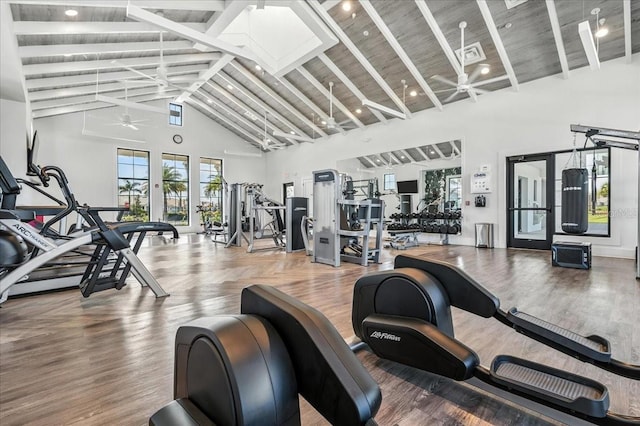 18525 Midsummer Pl, Venice, FL 34293 - exercise room with high vaulted ceiling, ceiling fan, healthy amount of natural light, wood finished floors, and beam ceiling