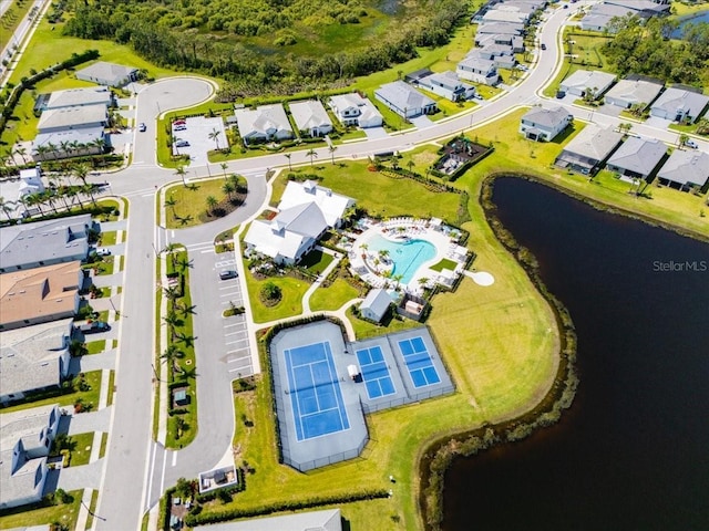 18525 Midsummer Pl, Venice, FL 34293 - aerial view of residential area featuring a large body of water and a pool area