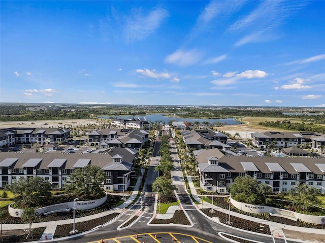 18525 Midsummer Pl, Venice, FL 34293 - aerial perspective of suburban area with a nearby body of water