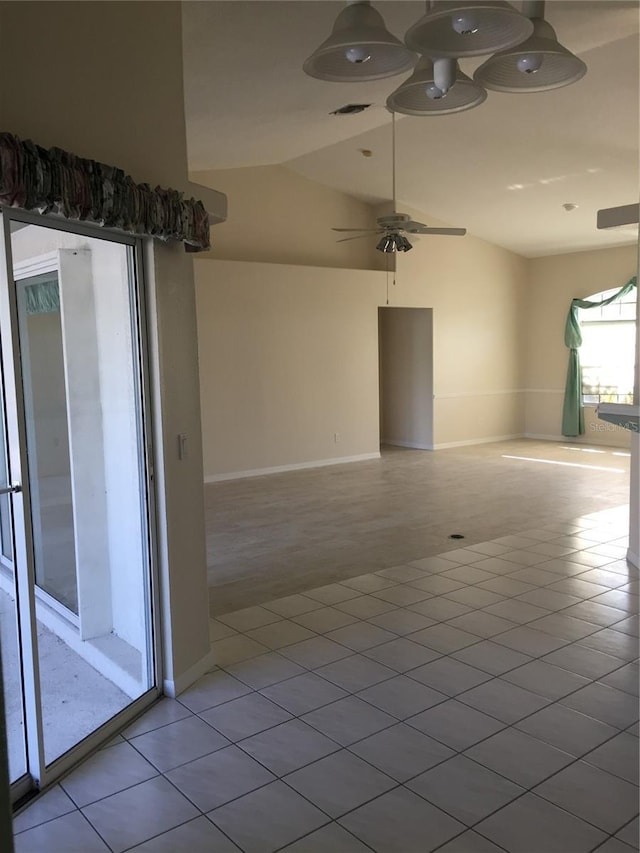 15140 Lyneburg Ave, Port Charlotte, FL 33981 - empty room featuring lofted ceiling, a ceiling fan, and tile patterned flooring