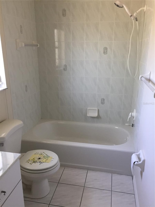 15140 Lyneburg Ave, Port Charlotte, FL 33981 - full bathroom with vanity, tile patterned flooring, and shower / washtub combination
