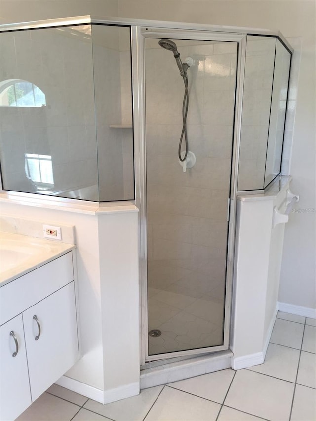 15140 Lyneburg Ave, Port Charlotte, FL 33981 - full bath featuring vanity, a shower stall, and tile patterned floors