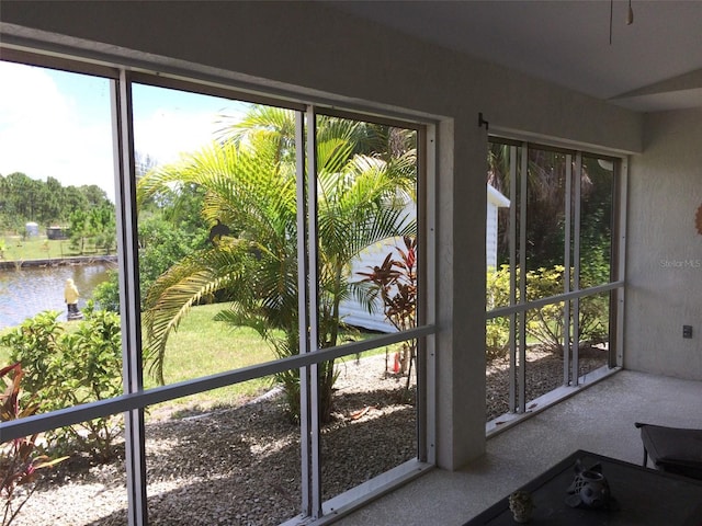15140 Lyneburg Ave, Port Charlotte, FL 33981 - unfurnished sunroom featuring a water view