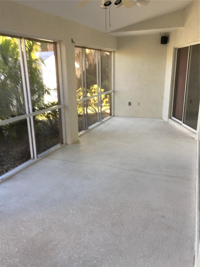 15140 Lyneburg Ave, Port Charlotte, FL 33981 - unfurnished sunroom featuring a ceiling fan