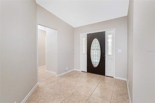 2631 S Cranberry Blvd, North Port, FL 34286 - foyer entrance with light tile patterned floors and baseboards