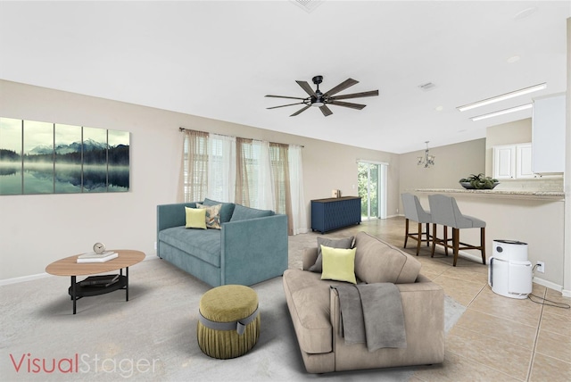 2631 S Cranberry Blvd, North Port, FL 34286 - living area with lofted ceiling, a ceiling fan, and light tile patterned floors