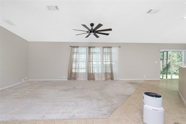 2631 S Cranberry Blvd, North Port, FL 34286 - spare room with a ceiling fan, light carpet, and light tile patterned floors