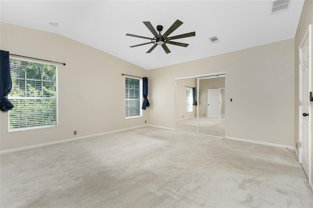2631 S Cranberry Blvd, North Port, FL 34286 - unfurnished bedroom featuring lofted ceiling, light colored carpet, a closet, and ceiling fan