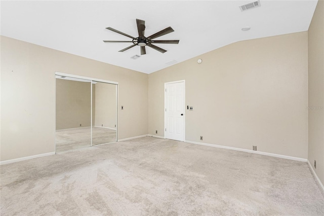 2631 S Cranberry Blvd, North Port, FL 34286 - unfurnished bedroom featuring vaulted ceiling, light colored carpet, a closet, and ceiling fan
