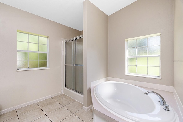 2631 S Cranberry Blvd, North Port, FL 34286 - bathroom with a garden tub, a stall shower, and tile patterned flooring