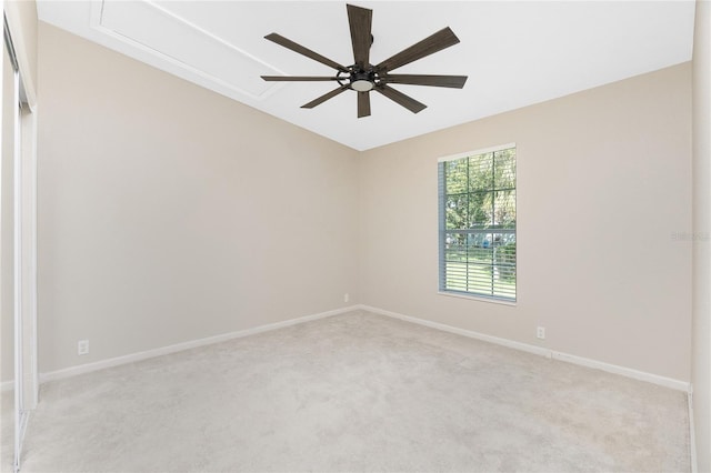 2631 S Cranberry Blvd, North Port, FL 34286 - empty room featuring attic access, ceiling fan, and light colored carpet