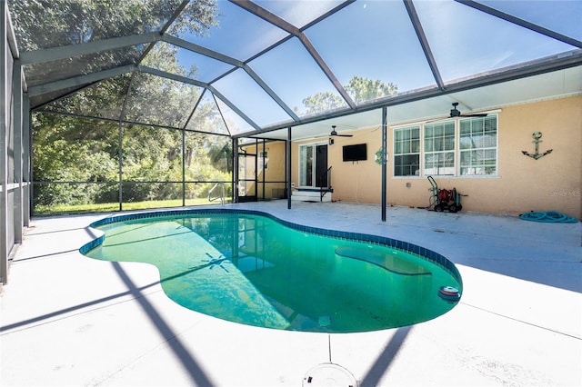 2631 S Cranberry Blvd, North Port, FL 34286 - swimming pool with a patio area, a ceiling fan, and glass enclosure