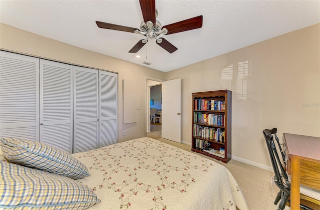 927 Capri Isles Blvd Unit 5, Venice, FL 34292 - bedroom featuring a closet, carpet, ceiling fan, and recessed lighting