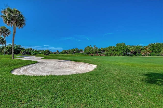 927 Capri Isles Blvd Unit 5, Venice, FL 34292 - surrounding community with a yard