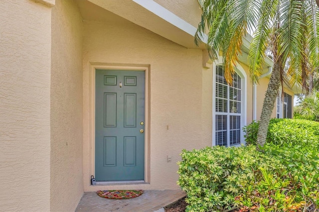 4841 Whispering Oaks Dr, North Port, FL 34287 - entrance to property with stucco siding