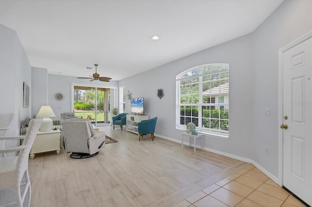 4841 Whispering Oaks Dr, North Port, FL 34287 - living room with ceiling fan and light wood finished floors