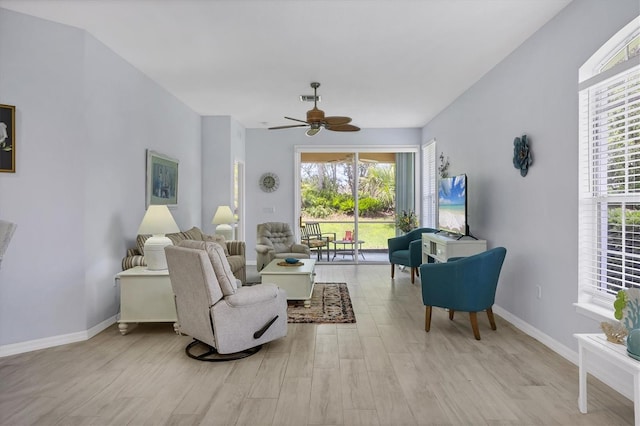 4841 Whispering Oaks Dr, North Port, FL 34287 - living room with ceiling fan and light wood-style flooring