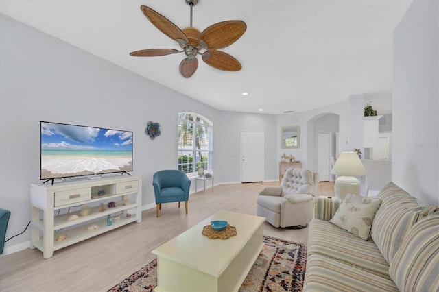 4841 Whispering Oaks Dr, North Port, FL 34287 - living room with arched walkways, ceiling fan, light wood-style flooring, and recessed lighting