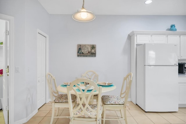 4841 Whispering Oaks Dr, North Port, FL 34287 - dining space with light tile patterned floors and recessed lighting