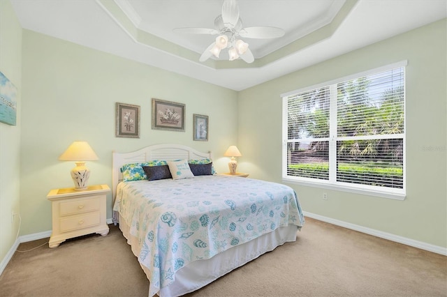 4841 Whispering Oaks Dr, North Port, FL 34287 - carpeted bedroom with a raised ceiling, crown molding, and ceiling fan