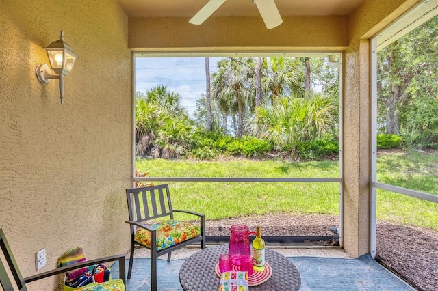 4841 Whispering Oaks Dr, North Port, FL 34287 - sunroom featuring a ceiling fan
