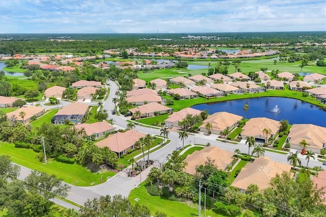 4841 Whispering Oaks Dr, North Port, FL 34287 - aerial perspective of suburban area with a nearby body of water and a golf course