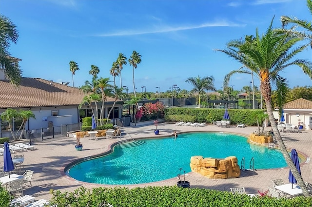 4841 Whispering Oaks Dr, North Port, FL 34287 - community pool with a patio area