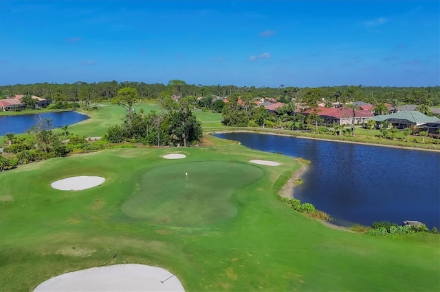 4841 Whispering Oaks Dr, North Port, FL 34287 - view of community with a water view, golf course view, and an area to practice putting