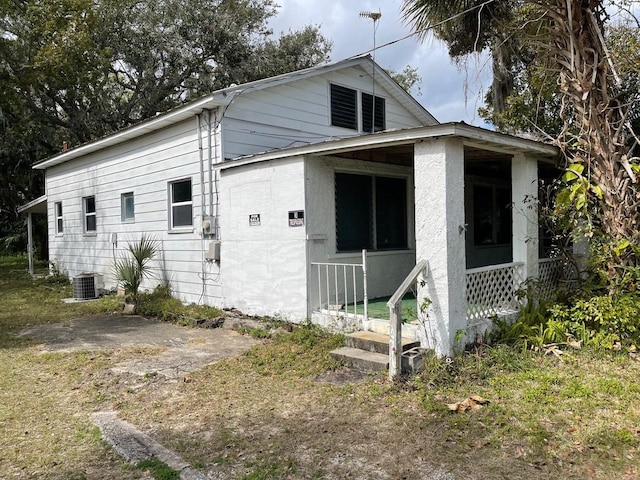 exterior space featuring central air condition unit