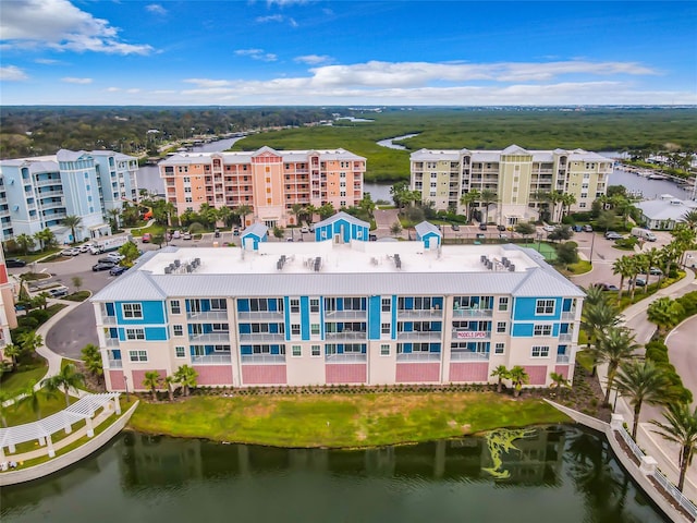 drone / aerial view with a water view