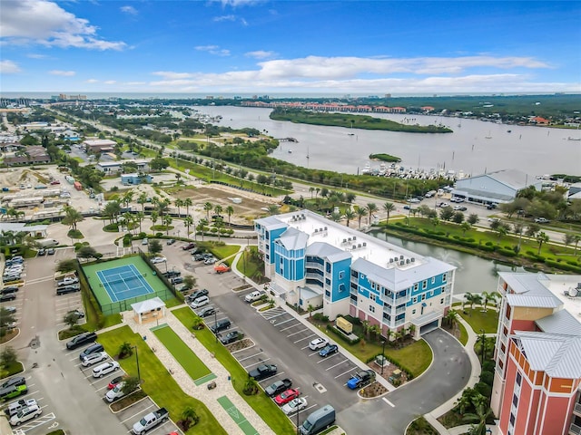 birds eye view of property featuring a water view