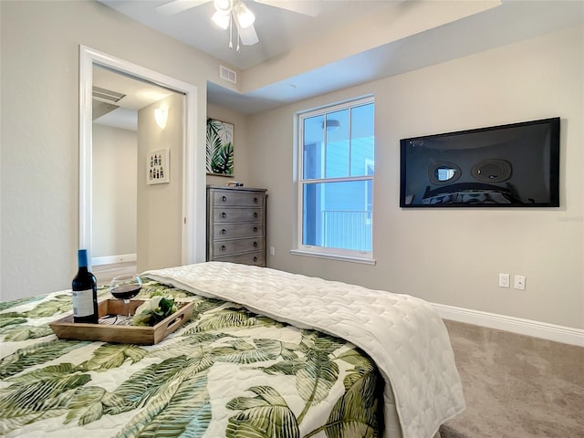 bedroom with ceiling fan and carpet floors