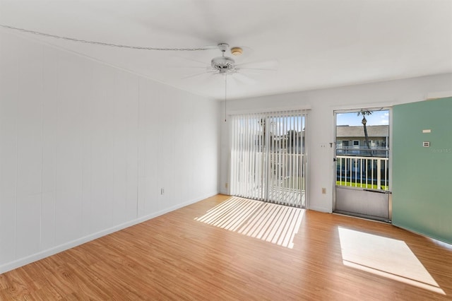 unfurnished room featuring light hardwood / wood-style flooring and ceiling fan