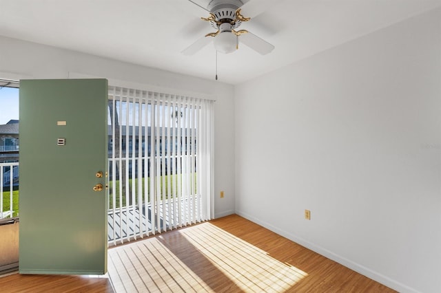 unfurnished room featuring ceiling fan and light hardwood / wood-style flooring