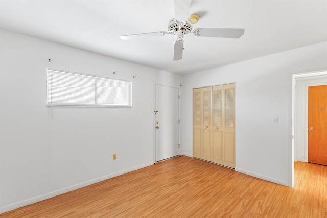 spare room with ceiling fan and light hardwood / wood-style flooring