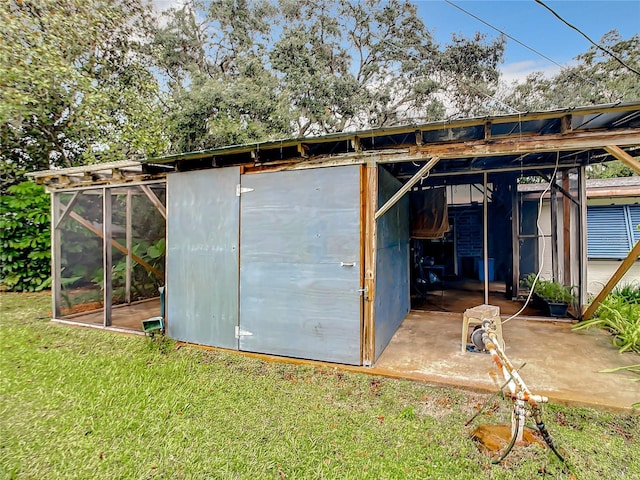 view of outdoor structure with a yard